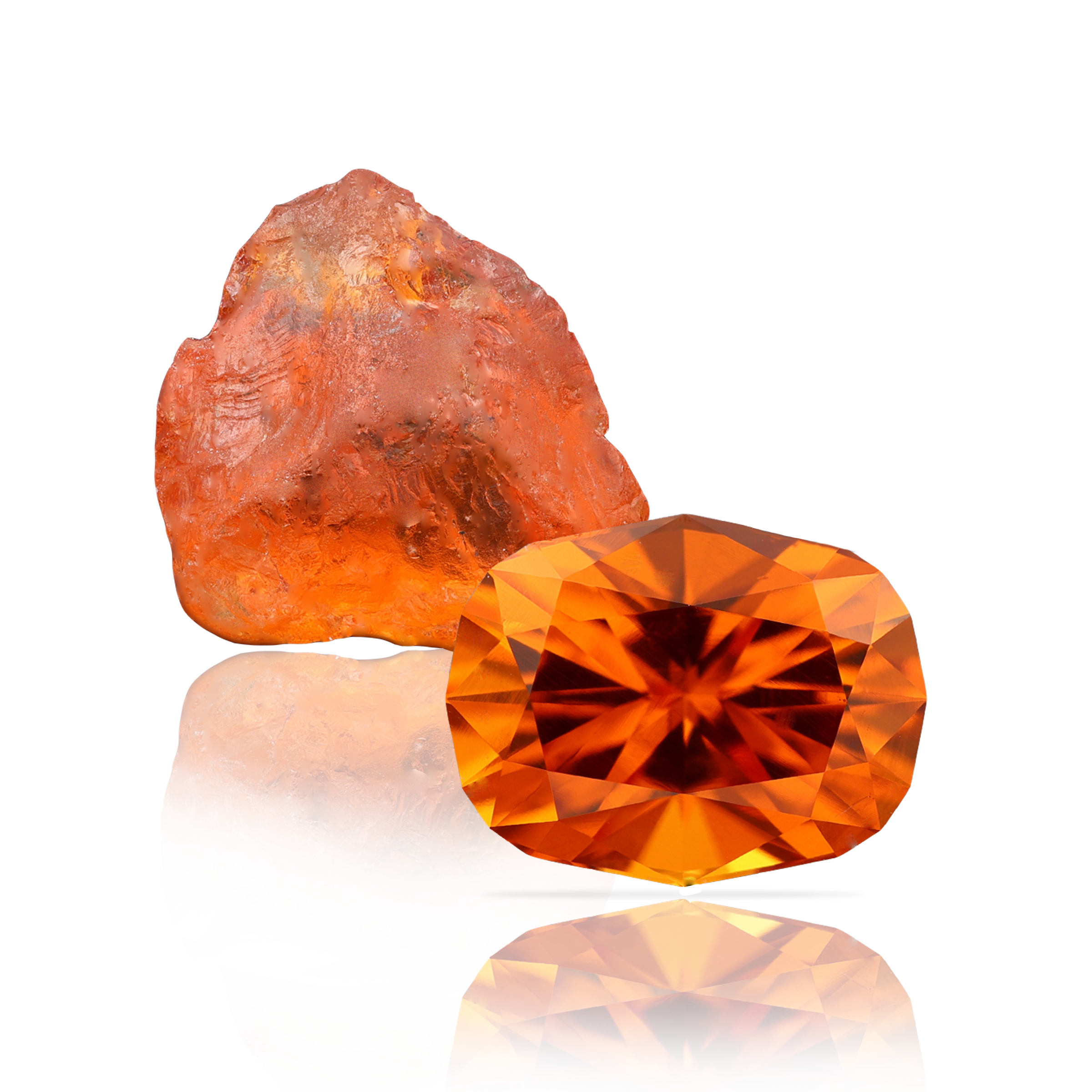 Oval precision cut spessartine mandarin garnet with a piece of facet rough gemstone