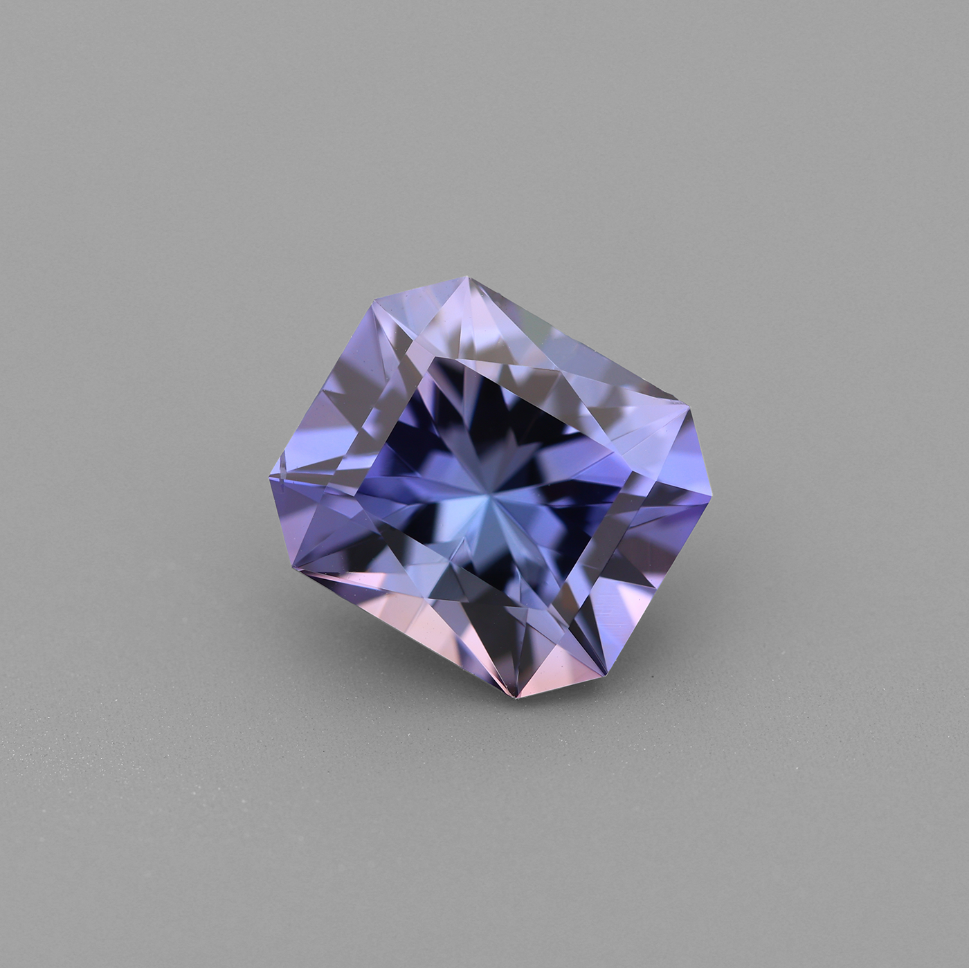 Precision-cut unheated Tanzanite displaying vivid blue and purple hues.